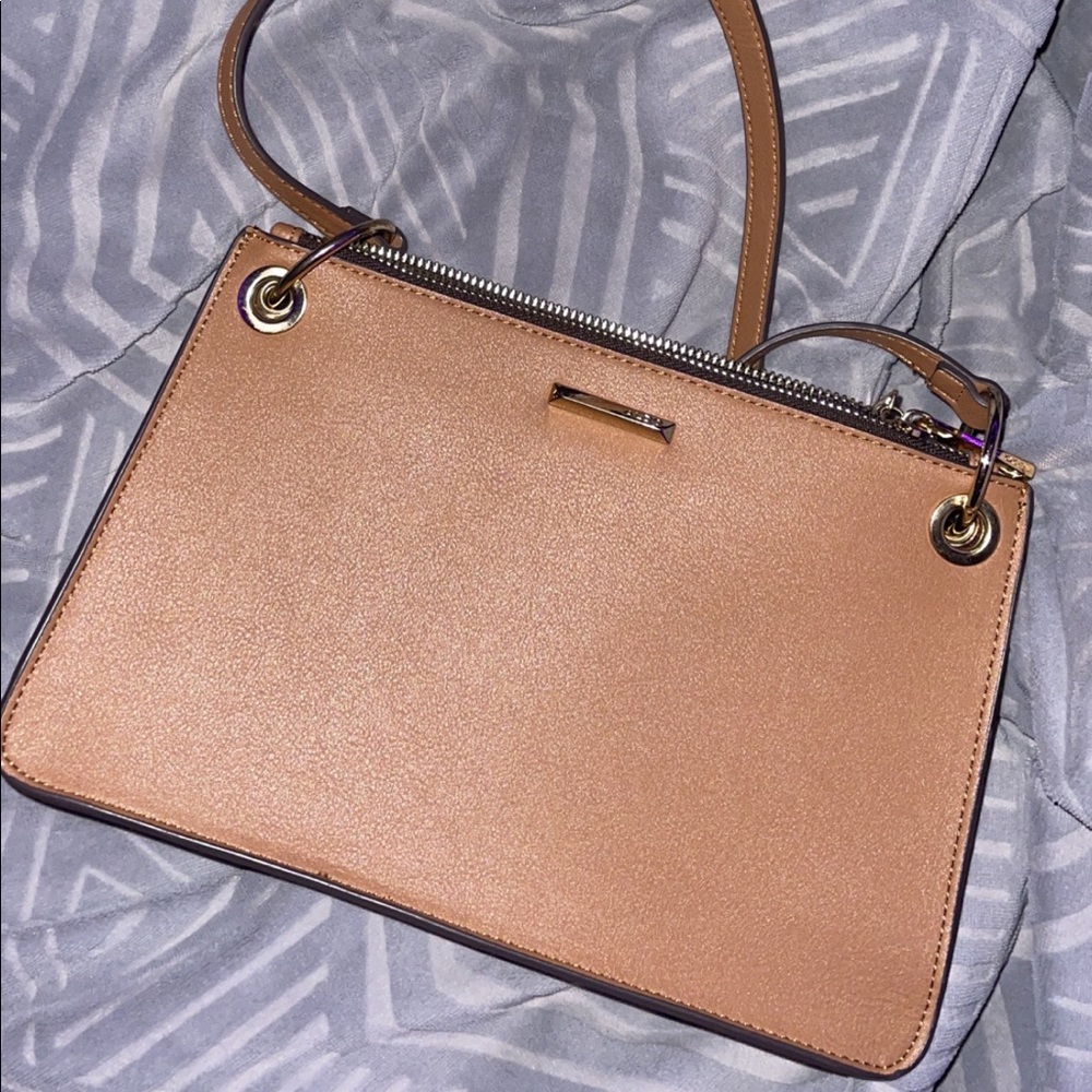 mid-size also purse, bought a year ago and used (literally) once!!